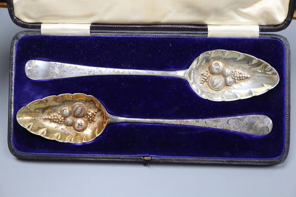 Mixed silver including cased silver cased berry spoons, cups, cream helmet, etc.